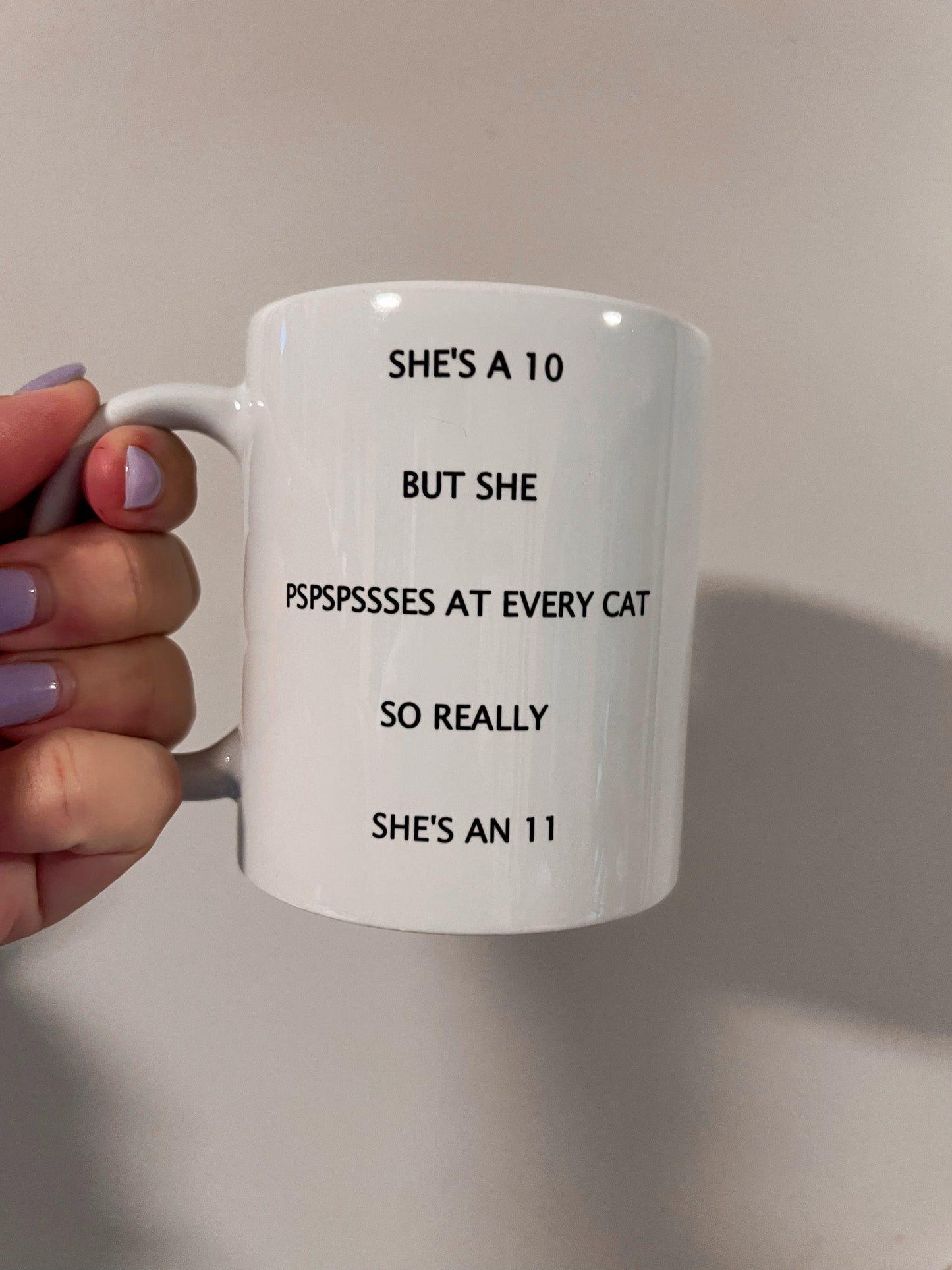 She’s a 11 cat lady mug